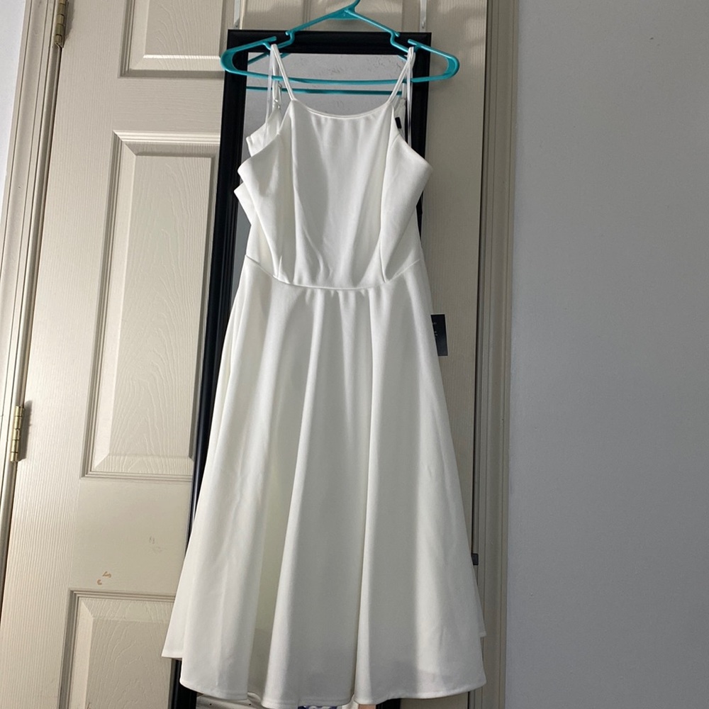 Brand new with tags Lulus white dress.